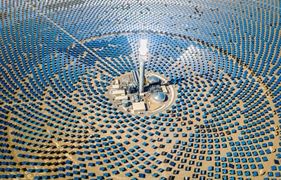 High Aerial view of large solar thermal power plant farm in the desert. Solar thermal power station. Nevada, USA.